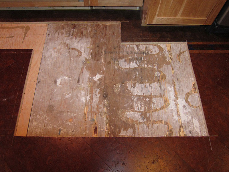 water damage shown on mobile home floor